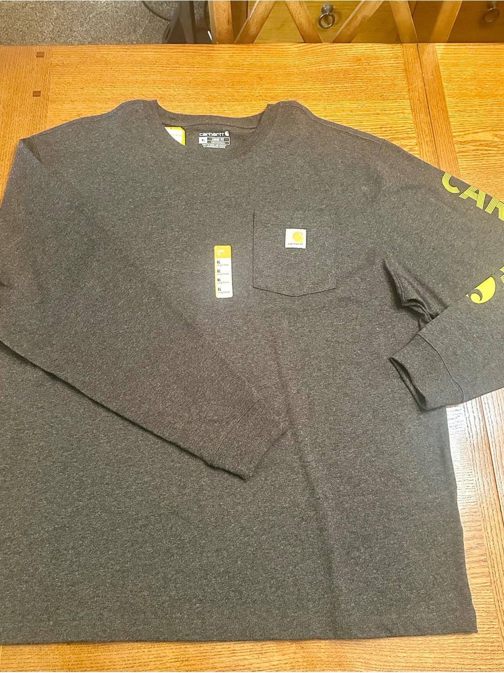 BNWT size XL Carhartt Dark Gray Long Sleeve Pocket Tee with Yellow Logo
